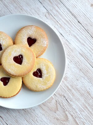 Jammy Dodgers recipe from Baking with Granny. Classic British biscuit. Melt-in-the-mouth, sandwiched with jam, and a little heart middle.