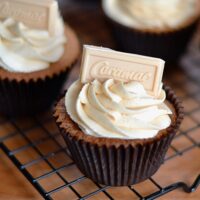 Caramac Cupcakes. Caramel white chooclate cupcakes, topped with a caramac buttercream and square of chocolate.