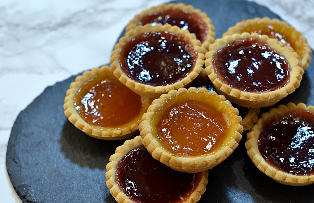 Jam Tarts recipe. Little pastry cups, filled with strawberry, raspberry and apricot jam.