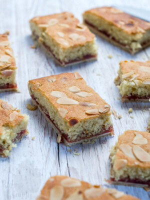 Almond Slice recipe, delicious traybake with a pastry base, jam layer and almond sponge top.