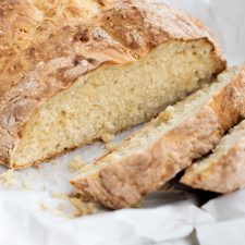 Slice Irish soda bread.
