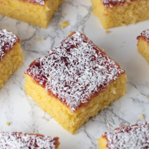School Cake recipe, topped with jam and coconut.