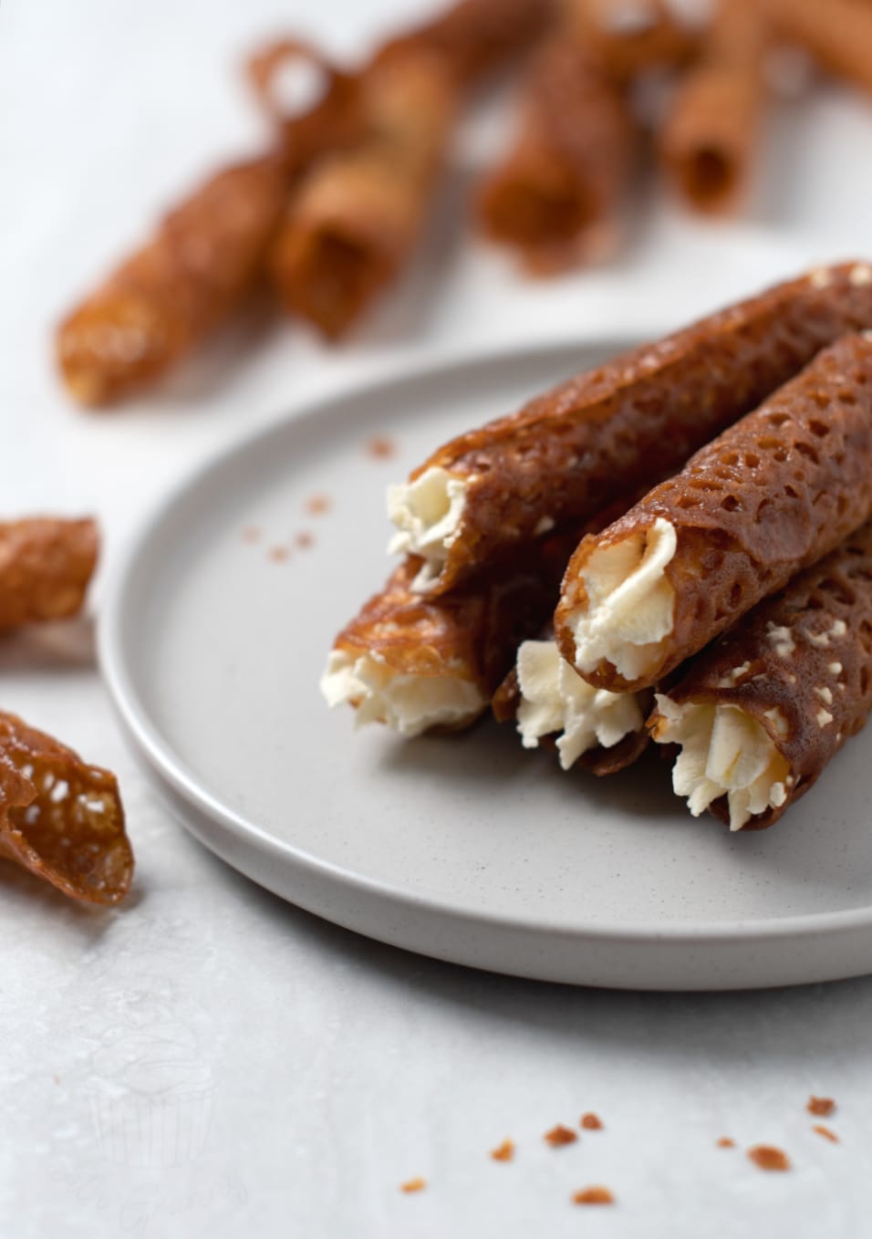 Brandy snaps from Baking with Granny. Traditional recipe for sweet, brandy-infused biscuits. best when filled with fresh cream.