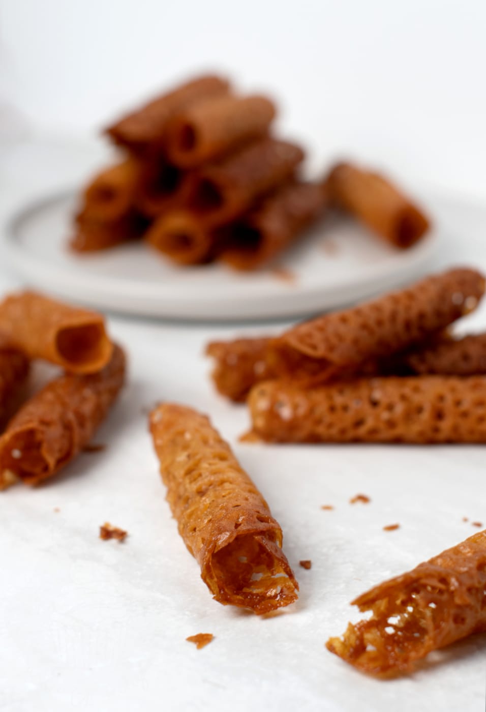 Brandy snaps recipe. Classic little sugar biscuits, wrapped to hold fresh cream or ice cream. Best served at parties.