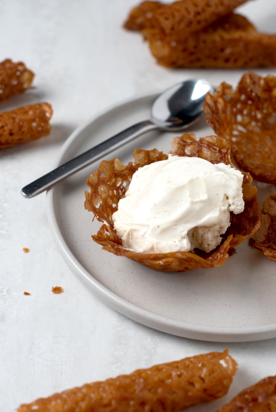 Brandy snaps biscuits recipe from Baking with Granny. Brandy snaps shaped into little bowls and served with ice cream.