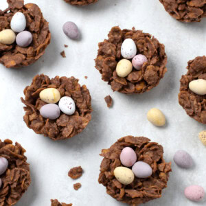 Chocolate Easter Nests, made with cornflakes, milk chocolate, butter, golden syrup and mini eggs.