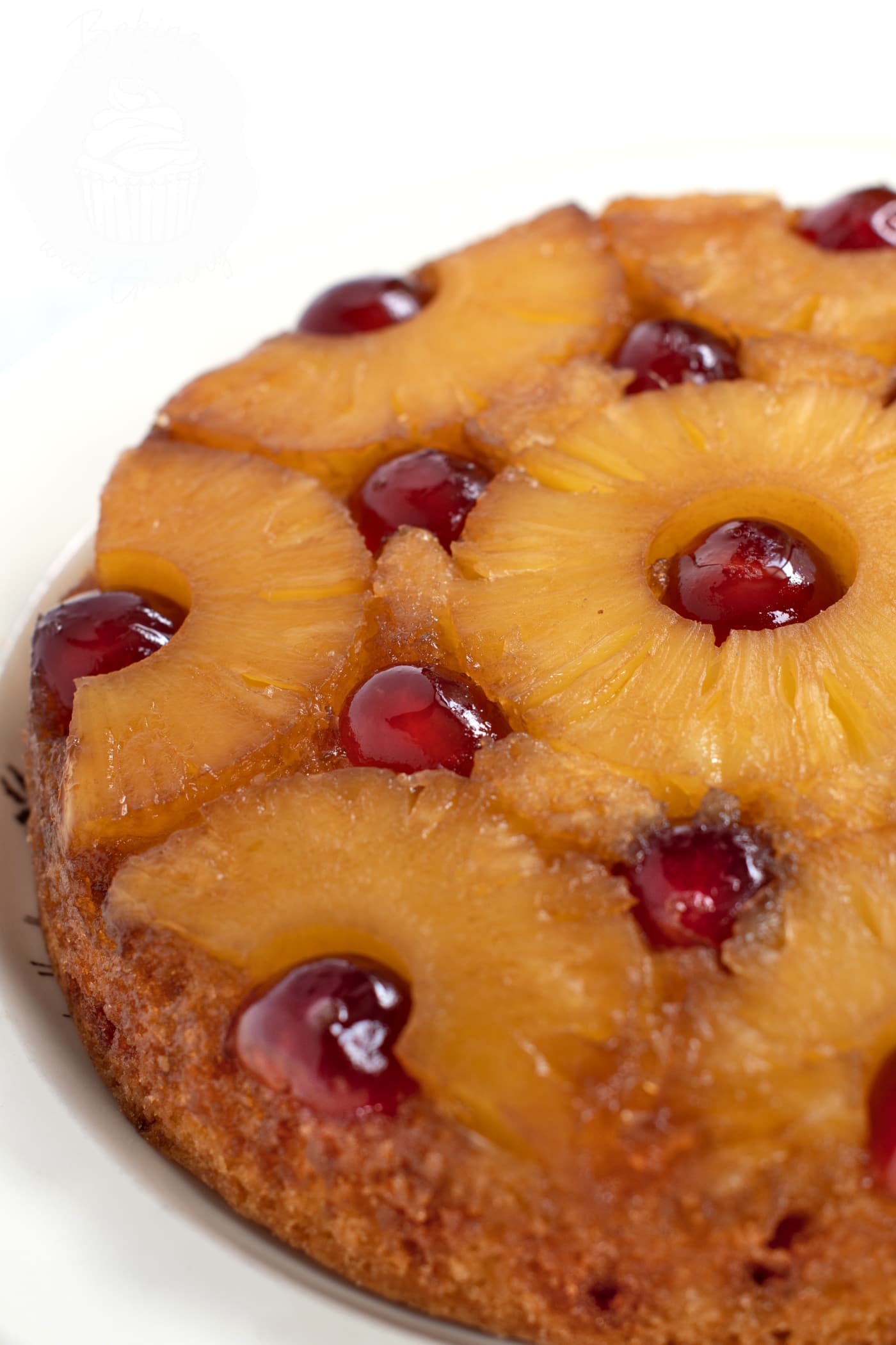 Delicious and easy to make Upside Down Pineapple Cake. Pineapple rings, with cherry centre's, with a golden sponge cake base.