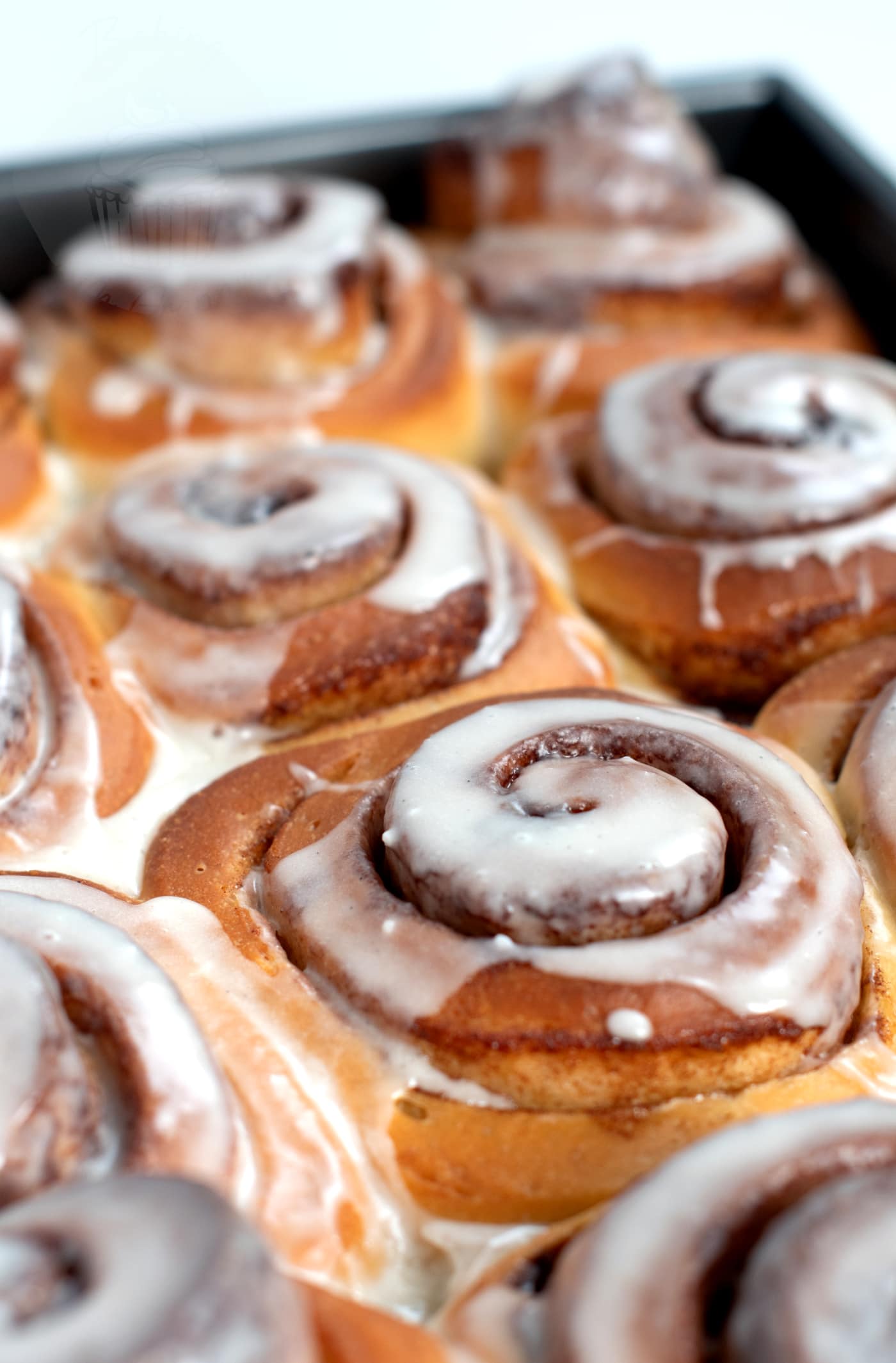 UK recipe for Cinnamon Buns, from Baking with Granny. Soft, doughy rolls, filled with sweet cinnamon, and topped with sticky icing.