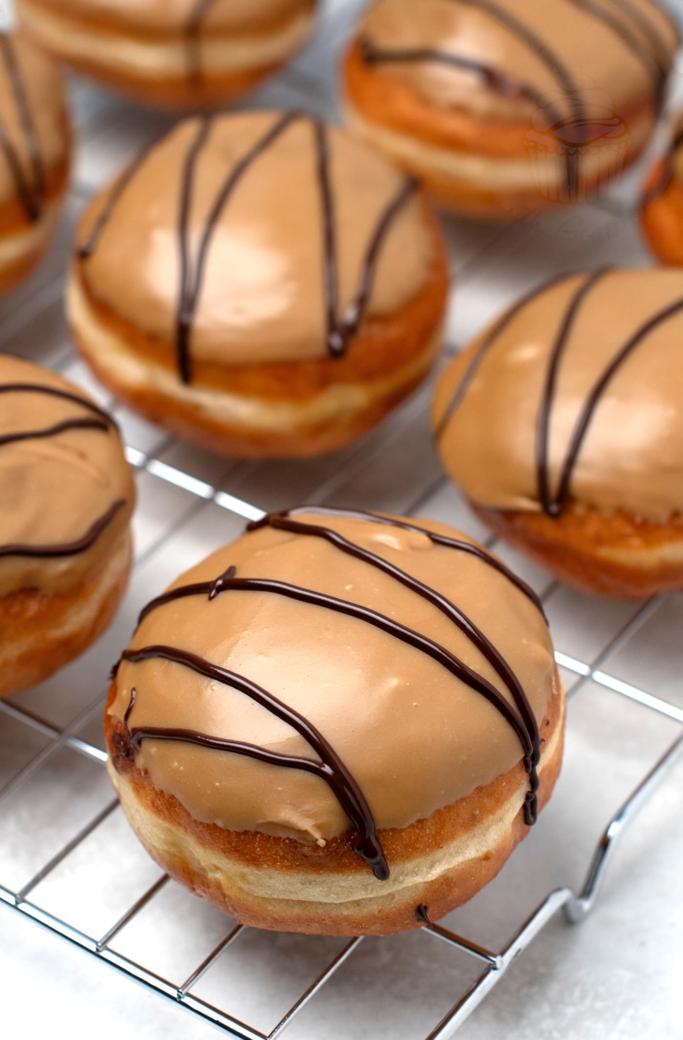 Fudge Donuts recipe from Baking with Granny. Custard filled donuts, topped with home made fudge icing.