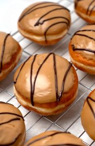 Scottish Fudge Donuts recipe from Baking with Granny. Yeast donuts, filled with custard, topped with homemade fudge icing.