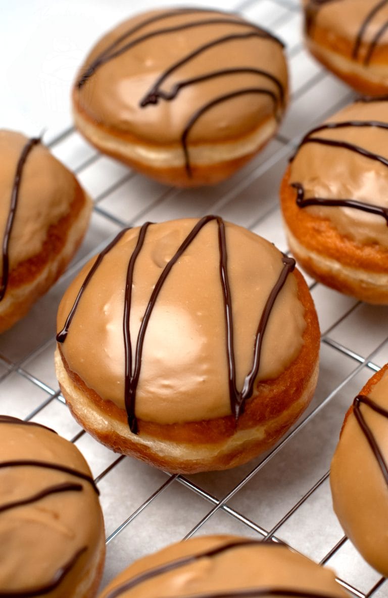 Scottish Fudge Donuts recipe from Baking with Granny. Yeast donuts, filled with custard, topped with homemade fudge icing.