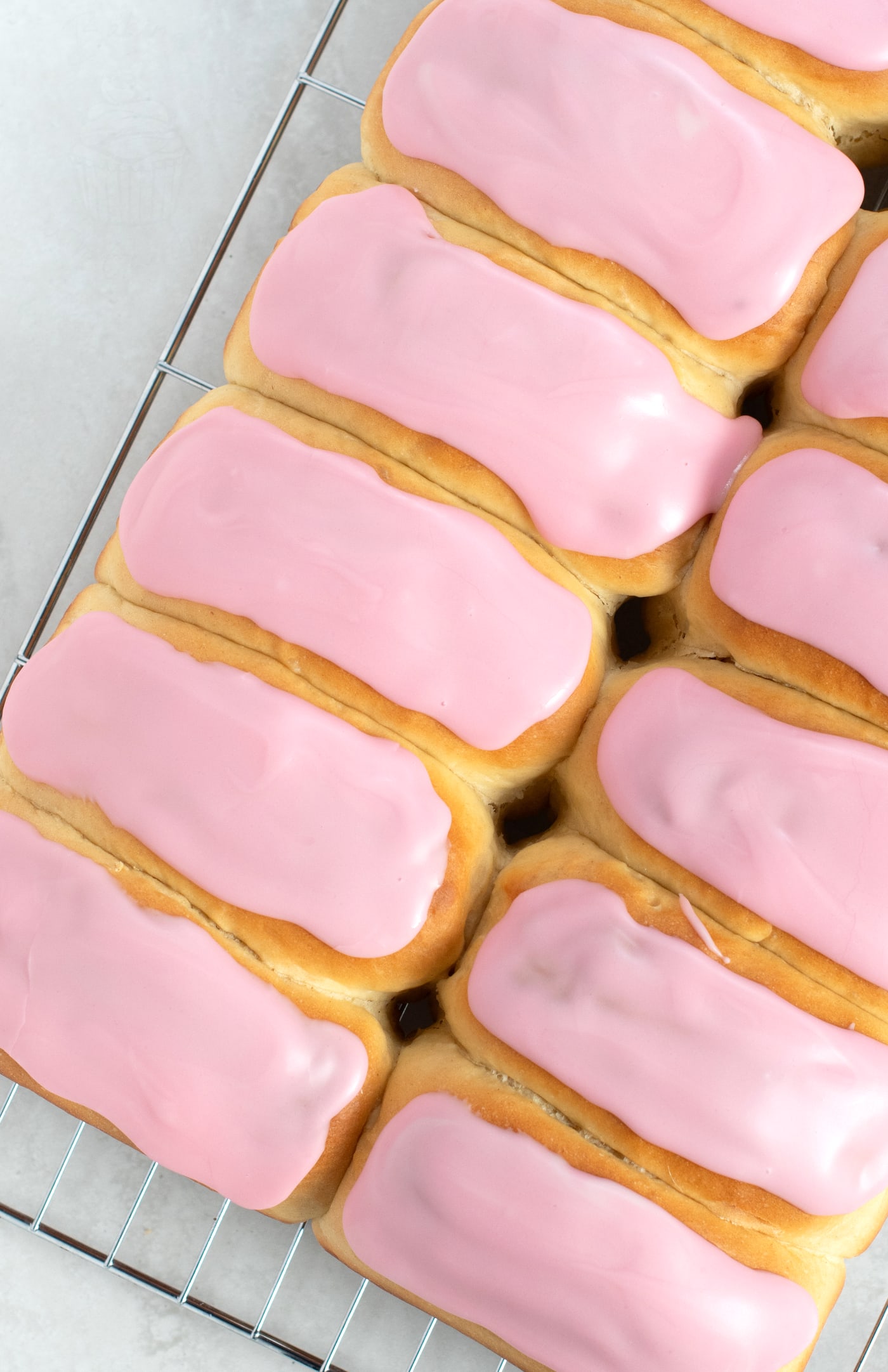 Iced Finger Buns from Baking with Granny. Traditional UK recipe for easy buns, topped with sweet, simple icing. A British classic.