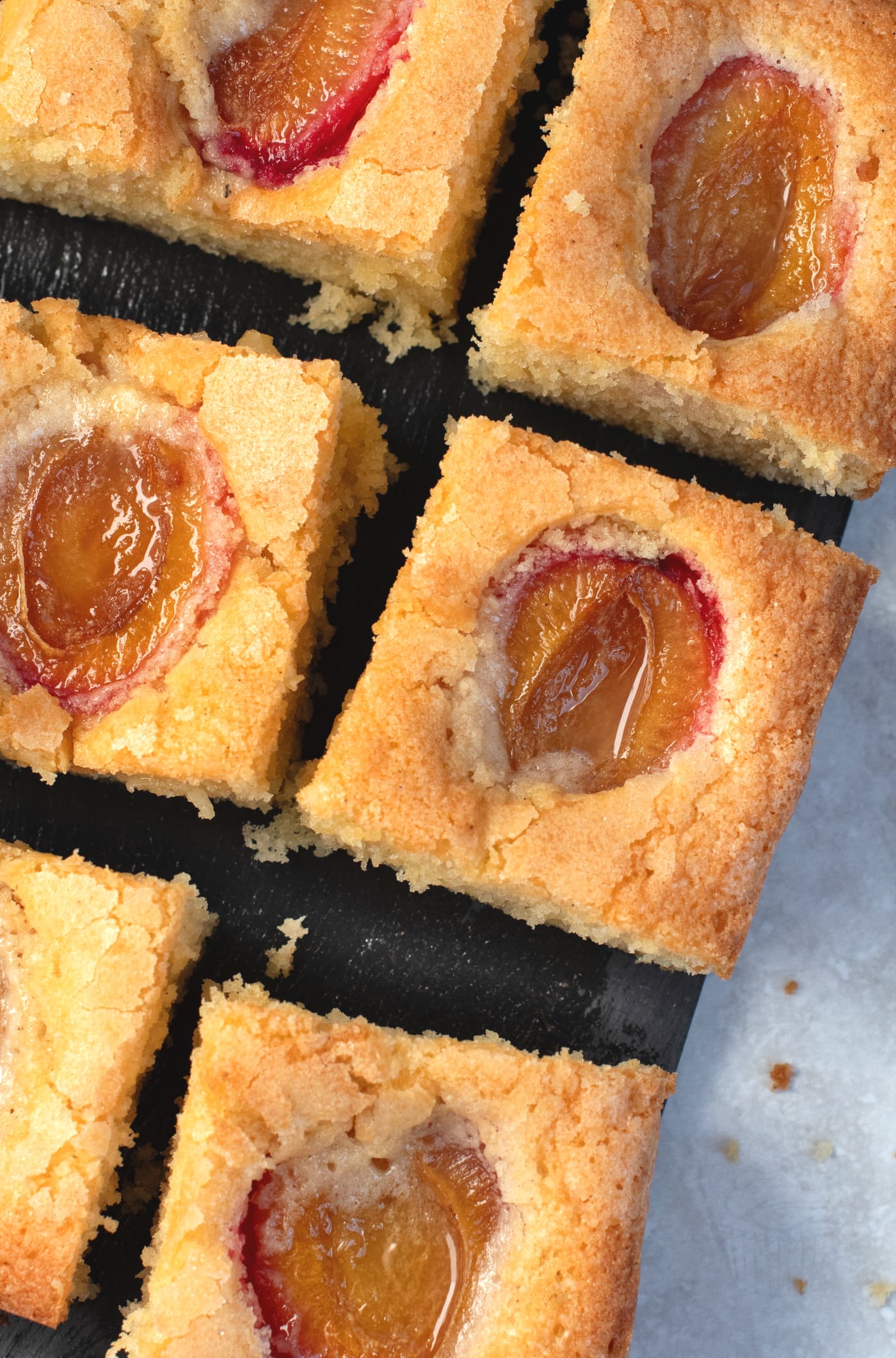 UK recipe for easy Plum Cake. Vanilla sponge, with juicy, fresh plums. Best served with ice cream or custard.