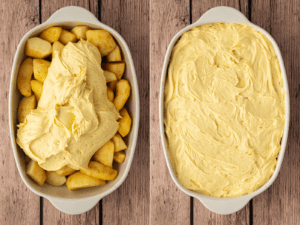 Raw cake batter being dolloped and spread over a seasoned sliced cooking apple base in a white baking dish for an easy Eve's pudding recipe.