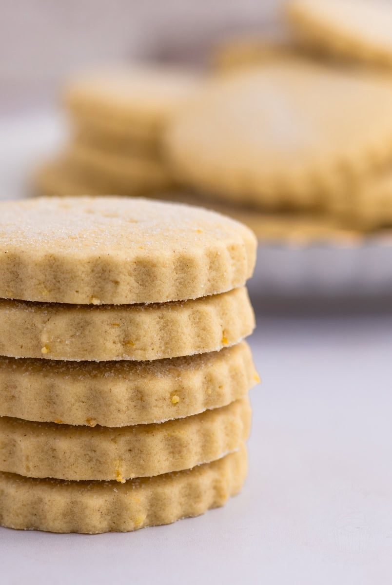 Stack of traditional Scottish Tantallon Cakes biscuits with a light sugar dusting.